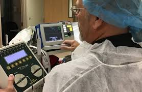 BioMed biomedical engineer demonstrating expertise on medical device